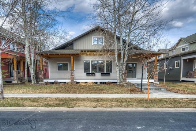 113 Nash Creek Ln, Bozeman, MT 59715 - view of front facade featuring a porch and board and batten siding