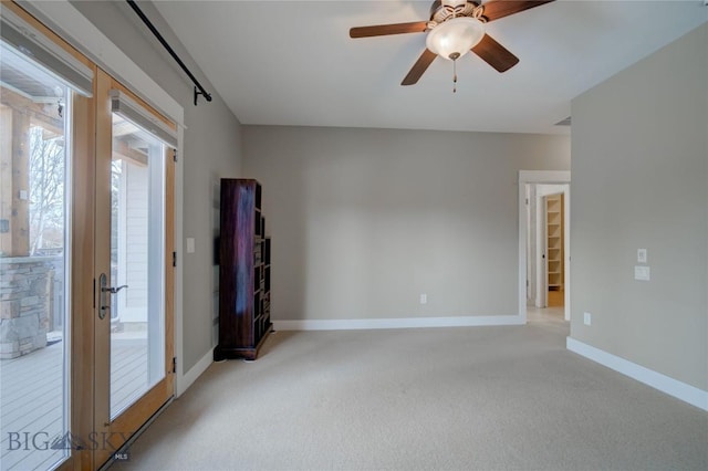 113 Nash Creek Ln, Bozeman, MT 59715 - empty room with light carpet, baseboards, and a ceiling fan