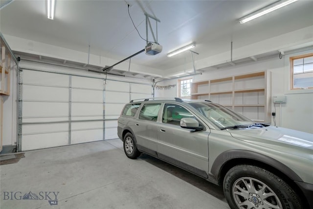 113 Nash Creek Ln, Bozeman, MT 59715 - garage featuring a garage door opener