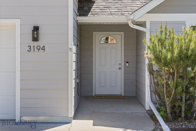 3194 Oliver St, Bozeman, MT 59718 - property entrance with roof with shingles