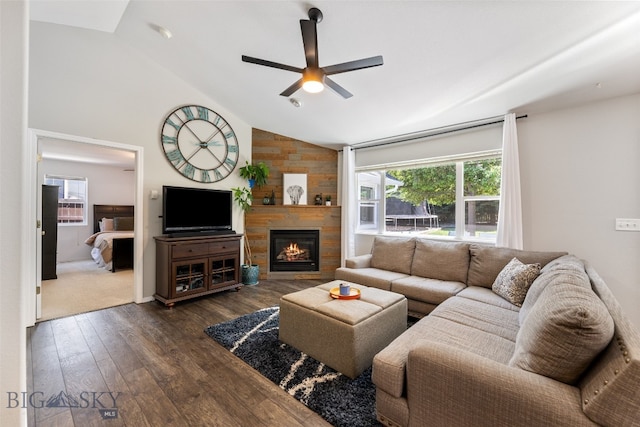 3194 Oliver St, Bozeman, MT 59718 - living area with a ceiling fan, vaulted ceiling, dark wood-style flooring, and a large fireplace