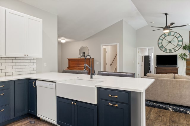 3194 Oliver St, Bozeman, MT 59718 - kitchen with dishwasher, open floor plan, a peninsula, dark wood-style floors, and a sink
