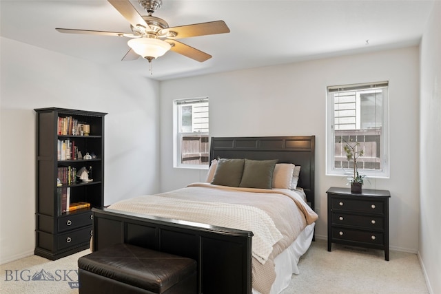 3194 Oliver St, Bozeman, MT 59718 - bedroom featuring light colored carpet, ceiling fan, and baseboards
