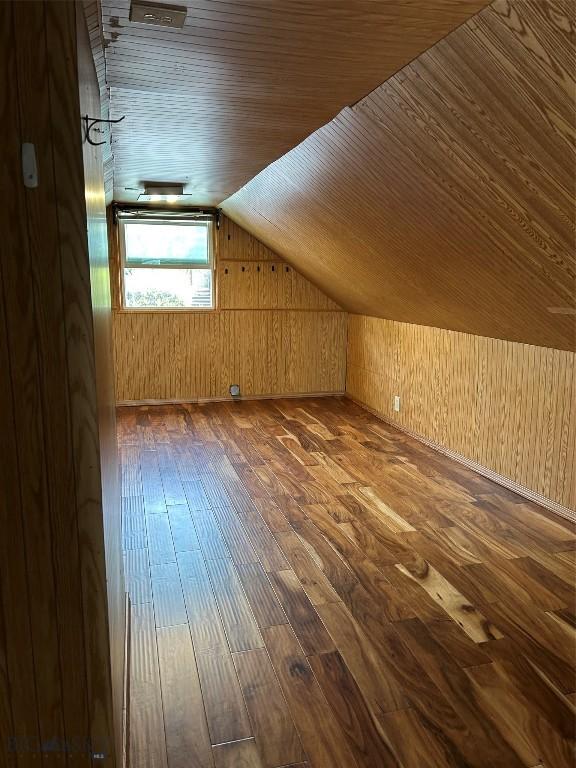 1106 Caledonia St, Butte, MT 59701 - bonus room with wood-type flooring, vaulted ceiling, wood walls, and wooden ceiling