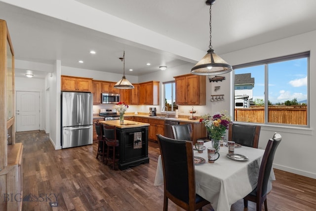 1165 Stewart Loop, Bozeman, MT 59718 - dining area with dark wood-style flooring, baseboards, and recessed lighting