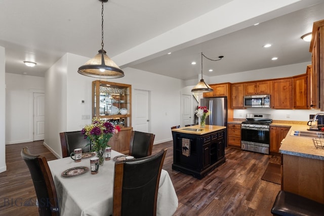 1165 Stewart Loop, Bozeman, MT 59718 - dining space featuring dark wood finished floors, recessed lighting, and baseboards