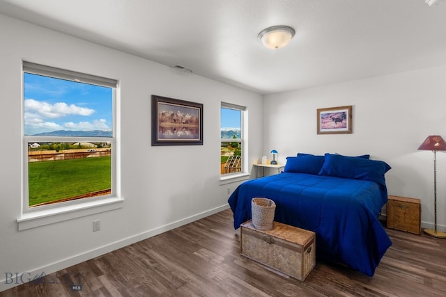 1165 Stewart Loop, Bozeman, MT 59718 - bedroom featuring baseboards and wood finished floors