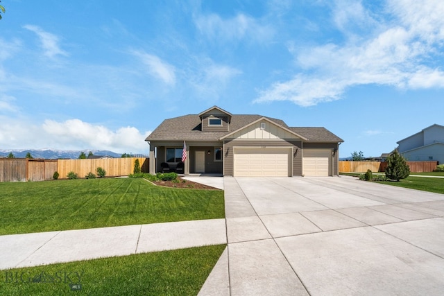 1165 Stewart Loop, Bozeman, MT 59718 - view of front facade with driveway, a garage, and a shingled roof