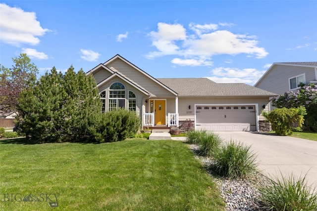 3197 Rose St, Bozeman, MT 59718 - view of front facade with a garage, a front yard, driveway, and stone siding