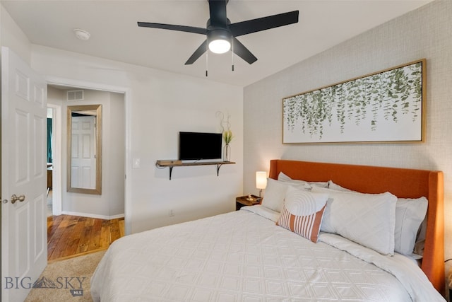 3197 Rose St, Bozeman, MT 59718 - bedroom with a ceiling fan, wood finished floors, and baseboards