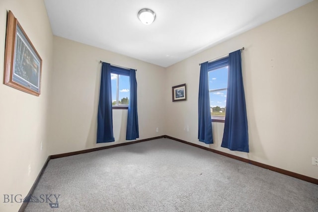 191 Barnes Dr, Belgrade, MT 59714 - empty room featuring carpet floors and baseboards