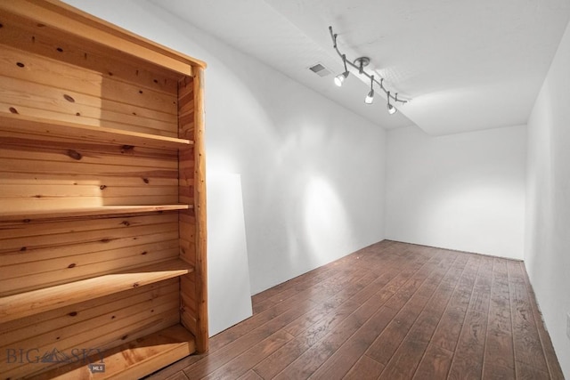 191 Barnes Dr, Belgrade, MT 59714 - walk in closet with dark wood-type flooring