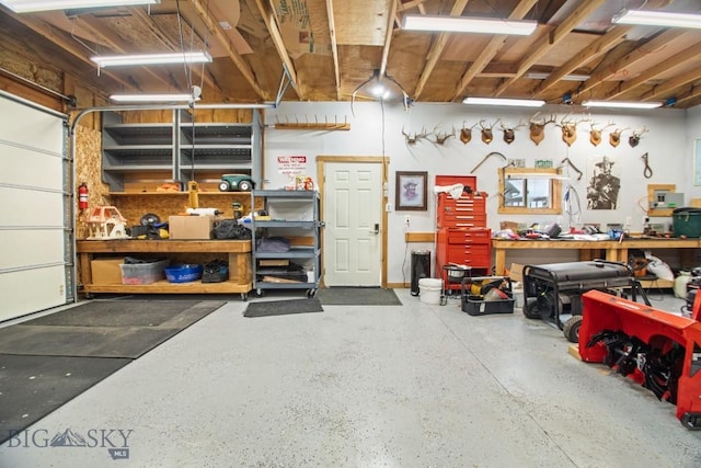 191 Barnes Dr, Belgrade, MT 59714 - garage with a workshop area