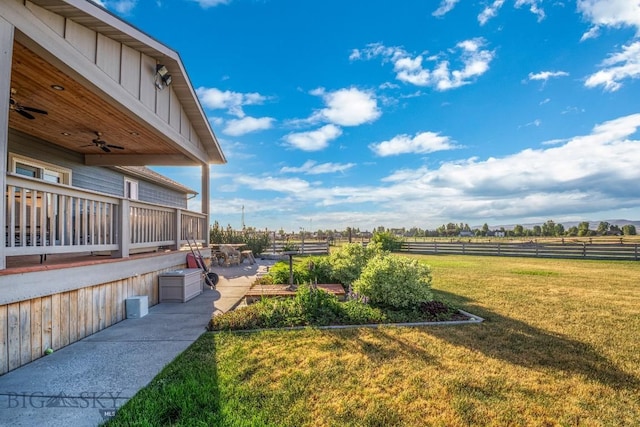 191 Barnes Dr, Belgrade, MT 59714 - view of yard featuring a ceiling fan and a rural view