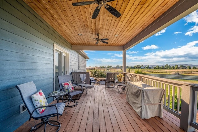 191 Barnes Dr, Belgrade, MT 59714 - wooden terrace featuring a ceiling fan and a rural view