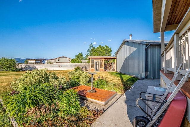191 Barnes Dr, Belgrade, MT 59714 - view of yard with an outbuilding and a patio