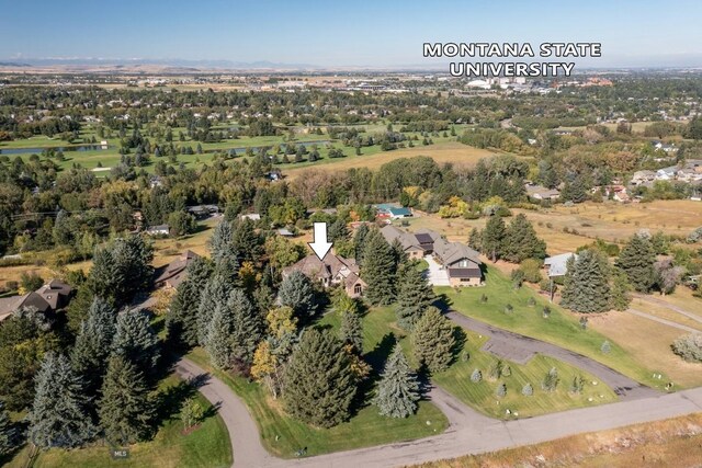 2421 Highland Blvd, Bozeman, MT 59715 - aerial view of property and surrounding area with a tree filled landscape