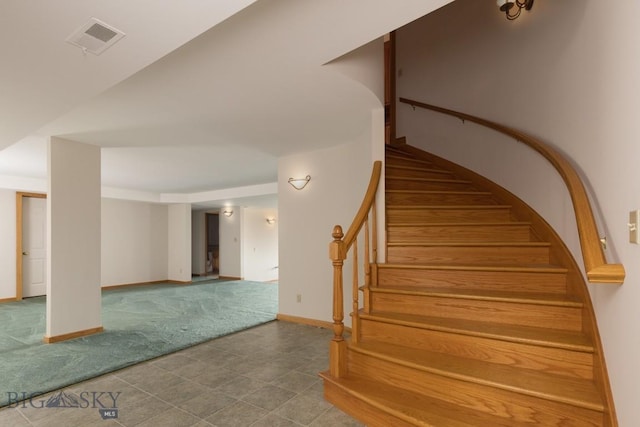 2421 Highland Blvd, Bozeman, MT 59715 - staircase featuring baseboards and carpet