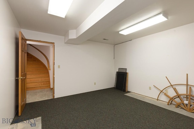 2421 Highland Blvd, Bozeman, MT 59715 - empty room with dark carpet and stairway