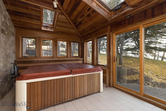 2421 Highland Blvd, Bozeman, MT 59715 - sunroom with a skylight, a hot tub, lofted ceiling, plenty of natural light, and wooden ceiling