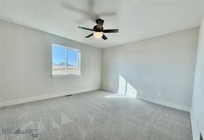 17 Durango Trl, Three Forks, MT 59752 - spare room featuring baseboards, carpet flooring, and a ceiling fan