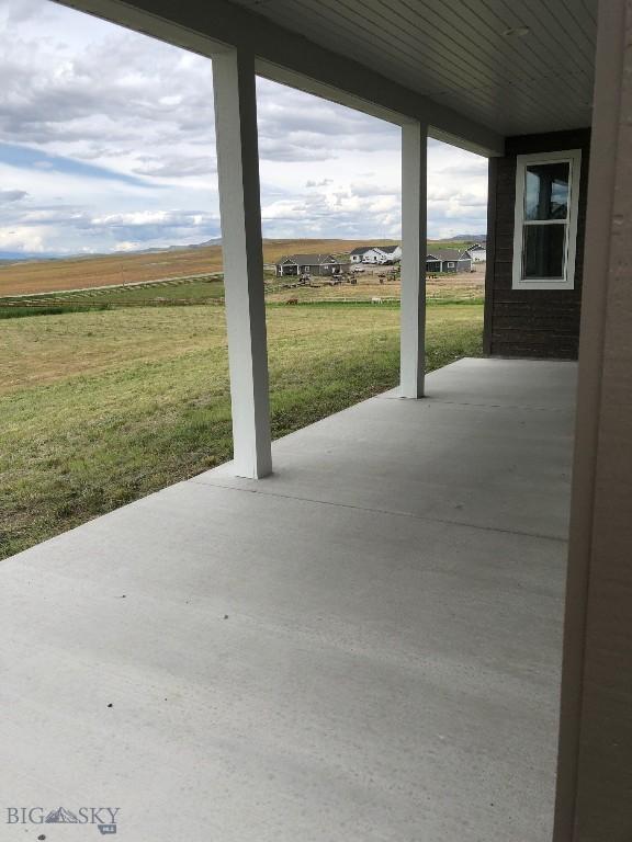 17 Durango Trl, Three Forks, MT 59752 - view of patio / terrace featuring a rural view