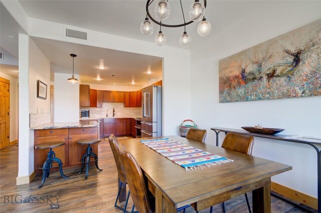 424 E Main St Unit E, Bozeman, MT 59715 - dining area with wood finished floors and baseboards
