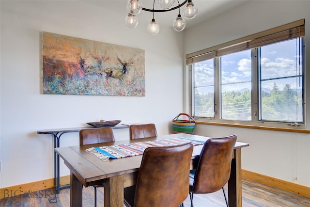 424 E Main St Unit E, Bozeman, MT 59715 - dining space with baseboards and wood finished floors
