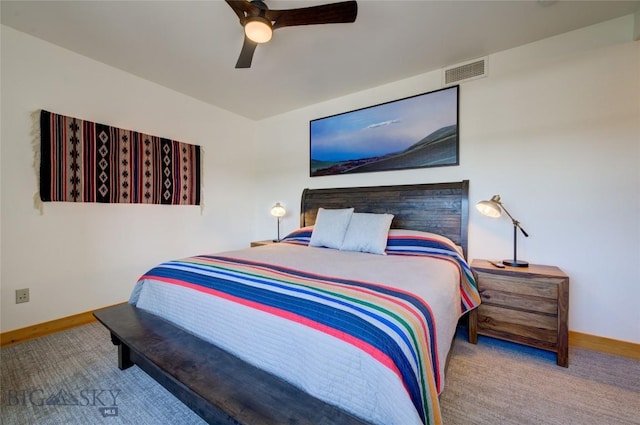 424 E Main St Unit E, Bozeman, MT 59715 - carpeted bedroom featuring baseboards and a ceiling fan