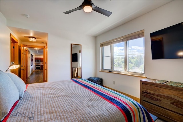 424 E Main St Unit E, Bozeman, MT 59715 - bedroom with ceiling fan and wood finished floors