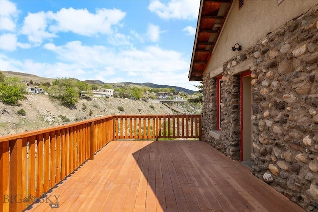 312 Water St, Gardiner, MT 59030 - wooden deck with a mountain view