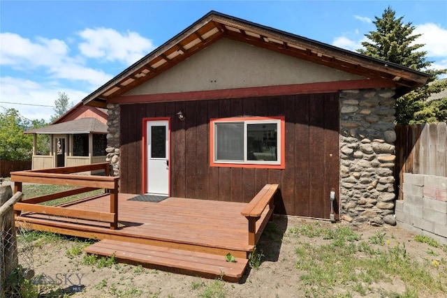 312 Water St, Gardiner, MT 59030 - rear view of property with stone siding