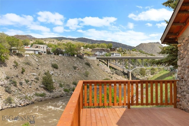 312 Water St, Gardiner, MT 59030 - wooden deck featuring a mountain view