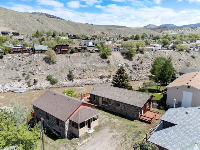 312 Water St, Gardiner, MT 59030 - aerial perspective of suburban area with mountains