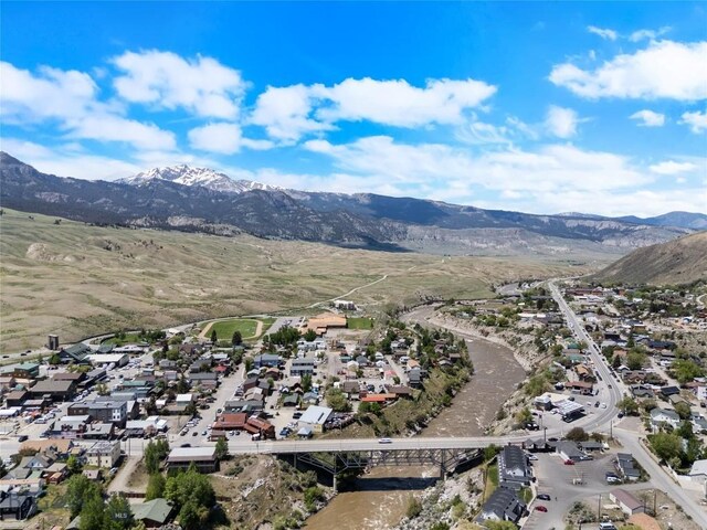 312 Water St, Gardiner, MT 59030 - aerial perspective of suburban area with a mountain backdrop