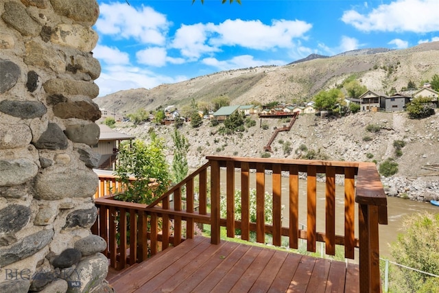 504 4th St, Gardiner, MT 59030 - wooden deck with a mountain view