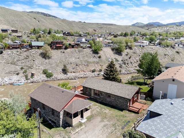504 4th St, Gardiner, MT 59030 - aerial perspective of suburban area featuring a mountain backdrop
