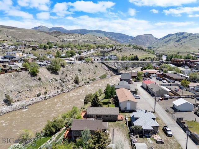 504 4th St, Gardiner, MT 59030 - aerial perspective of suburban area featuring a mountain backdrop