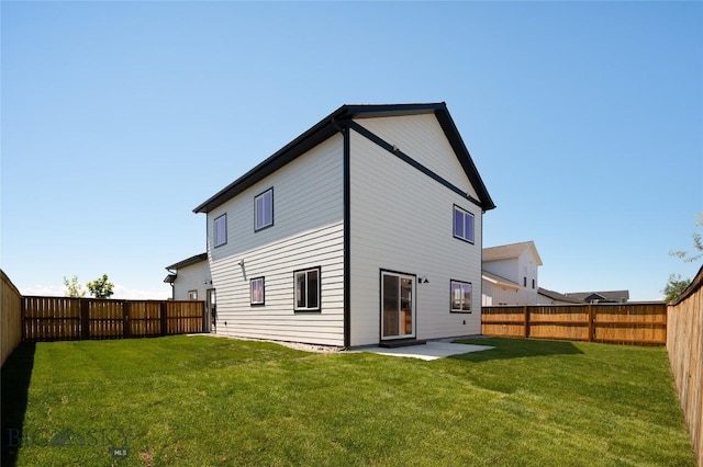 1505 Pistolero Way, Belgrade, MT 59714 - back of property featuring a patio