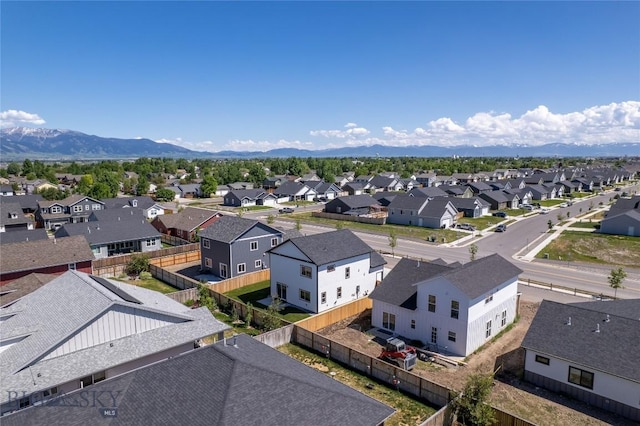 1505 Pistolero Way, Belgrade, MT 59714 - aerial view of residential area with a mountain backdrop