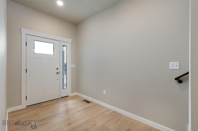 1505 Pistolero Way, Belgrade, MT 59714 - entryway featuring baseboards, light wood-type flooring, and recessed lighting