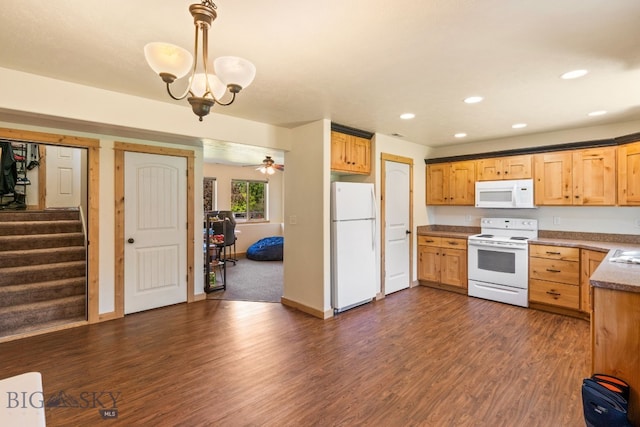 205 Water St, Sheridan, MT 59749 - kitchen with white appliances, dark wood-type flooring, recessed lighting, a chandelier, and decorative light fixtures