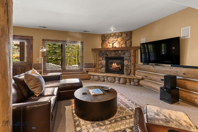 9 Manitou Loop Unit 45E, Big Sky, MT 59716 - carpeted living room with plenty of natural light and a fireplace