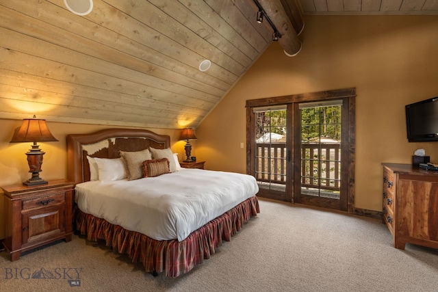 9 Manitou Loop Unit 45E, Big Sky, MT 59716 - carpeted bedroom featuring wooden ceiling, access to outside, and track lighting