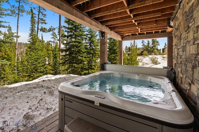 9 Manitou Loop Unit 45E, Big Sky, MT 59716 - view of patio with a hot tub