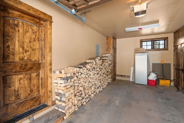9 Manitou Loop Unit 45E, Big Sky, MT 59716 - garage featuring a garage door opener