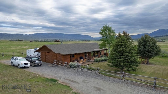16 Wilson Rd, Livingston, MT 59047 - view of front facade featuring a view of rural / pastoral area, a mountain view, and gravel driveway