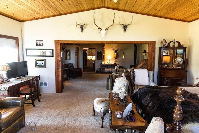16 Wilson Rd, Livingston, MT 59047 - carpeted living room featuring wood ceiling, crown molding, and vaulted ceiling