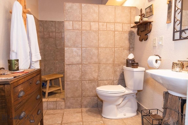 16 Wilson Rd, Livingston, MT 59047 - full bath featuring toilet, a walk in shower, and tile walls