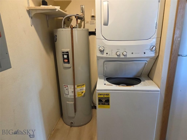 2 Kearney Ln, Sheridan, MT 59749 - washroom with electric water heater and stacked washer / drying machine
